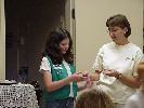 Dana receiving a Girl Scout award