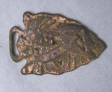 My best guess is a 40's or 50's watch fob.