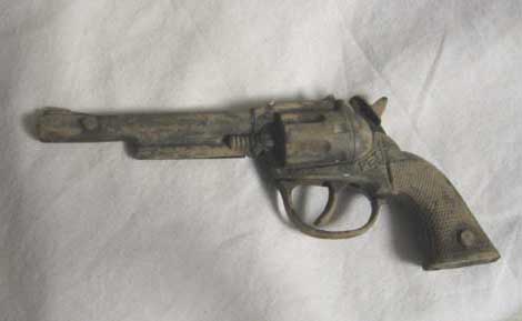 Cap gun found in field.