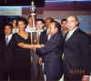 A nice lady present the Winning torphy to The Tigers