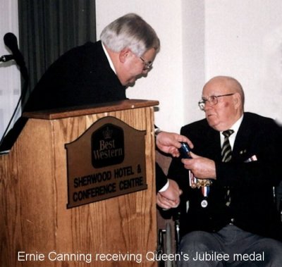 [Ernie Canning receiving Queen's Jubilee Medal]