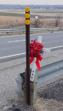 Near the highway patrol turnaround on the K-18 hill near Ogden...