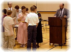the one who matters is dressed in a white shirt and dark pants...maybe shoes too...