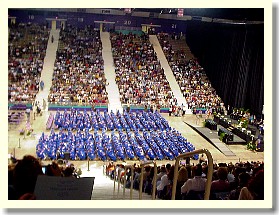 in the near section, row seven, third from the center aisle...