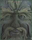 I have no clue why this guy is hanging in the dining room, but I'd miss it if it were moved or removed. Looks like Jesse Ventura, no?