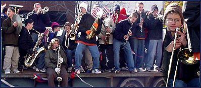 the middle school pep band at the Veterans' Day Parade on Friday...