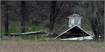 The fallen schoolhouse.