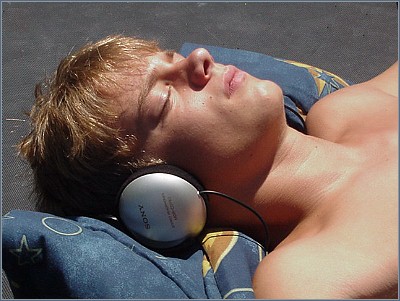 Owen rests on the trampoline soon after a long, hard morning's sleep: You'll grow into the nose, bub.