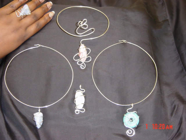 Rhodonite (center) gives confidence. Blue lace agate (left) gives awareness.&nbsp; Howlite (bottom) gives patience.&nbsp; Turquoise (left) brings spirituality.