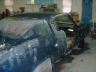 Second visit to body shop. Wet sand in progress
