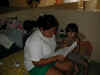 Brenda in Her Private Space and Helper Karina Reading.jpg (130907 bytes)
