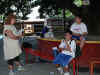 Missioner Vicki  Spelling in the Shade Tree Classroom.jpg (130147 bytes)
