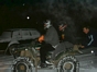 Fravor driving the 4 wheeler, with Nick on the back and Chris holding on