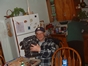 My dad holdin up his new shirt