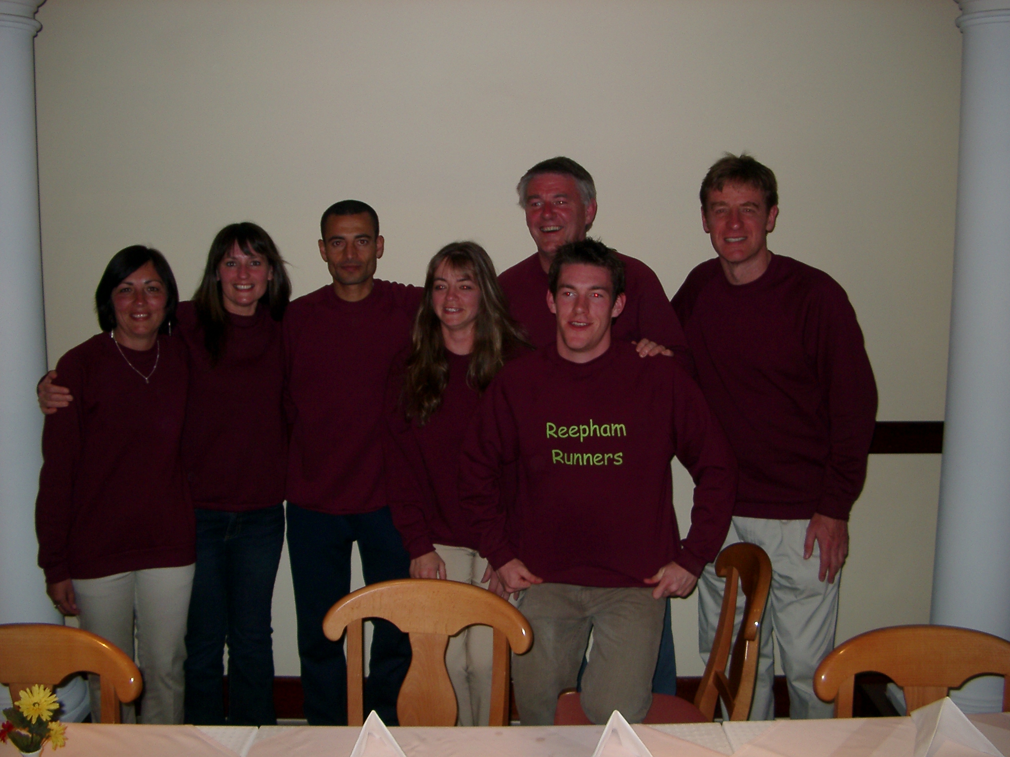 Team photo including the marathon winner, Abdel Kebir Marchane from Morocco