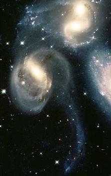 The birth of two new Galaxies after a cosmic collision (photo: NASA, Hubble Telescope)