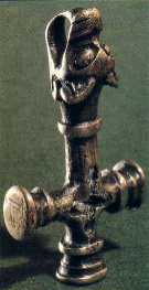 Combination of a heathen hammer symbol and a Christian cross symbol (silver, 10th century AD)