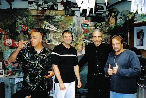 Dante has a drink while Pete, Evil,and Scott mingle among monsters!