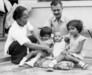 My Grandfather Ronald with young Louise, baby Myron & young Davida (my mummy )