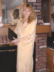 Rev. Angelle in her gold ceremonial robe