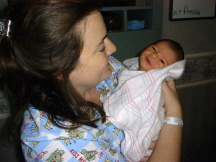 Here RFN2 blesses his Mommy with a beautiful smile a few hours after been born