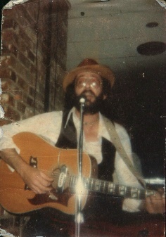 Richard's dad, Playing music... Or is that Tommy Chong  :)
