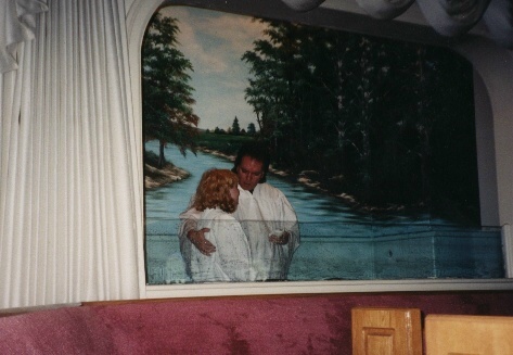 Teresa being baptised by Pastor Bobby Baldwin
