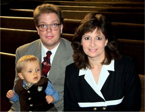 In this family group, Frank is to our left, with Thomas (11 mos here).  Leslie is on the right