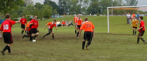 Casey works for a shot, John hopes for a pass, Ryan directs traffic