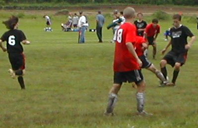 John fights for the ball