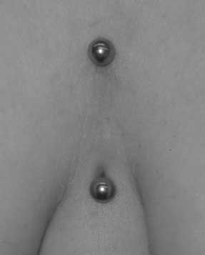 sternum surface piercing on Val, a long time client & wicked chick!!