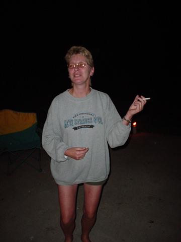Linda getting down with the groove with her air guitar.  Either that or she has to pee.  I'm not too sure on that one.