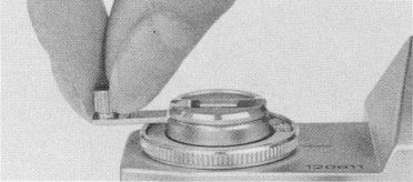 Bell and Howell Auto 35, film advance lever