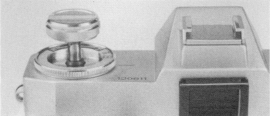 Bell and Howell Auto 35, film rewind knob