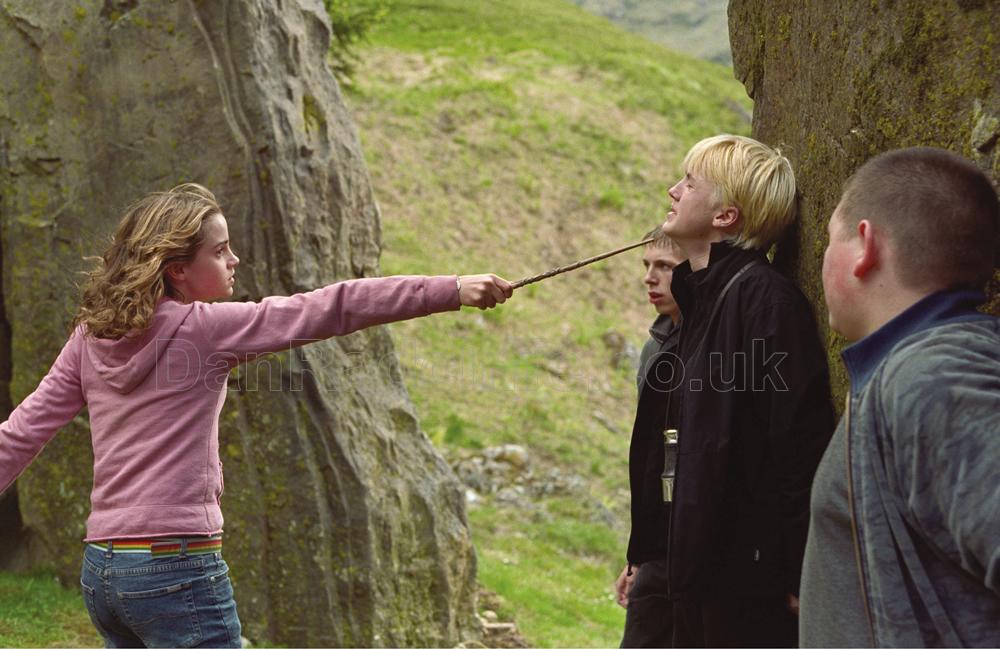 Hermione threatening Malfoy with her wand, go her! :D