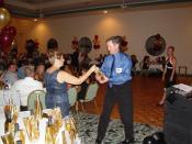Carlton Hersham receives prize for person who traveled the farthest (San Diego)
