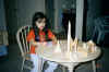 Nika playing with blocks at her desk