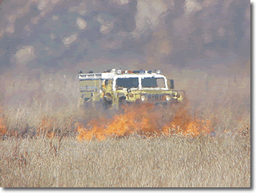 HMMWV on a brush fire