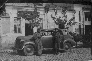 August 22, 1942. WW II. Car: unknown. He's the one on the left.