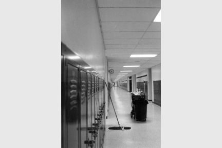 School's out, only the janitor remains in quiet hallways.