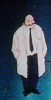 Standing and smilen'