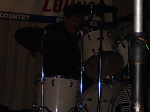 Greg kicking out the jams on the skins at the Dolphin Lounge