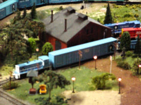 The SW1600 switching a 80' boxcar