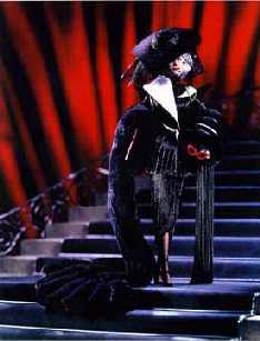cruella de vil power in pinstripes