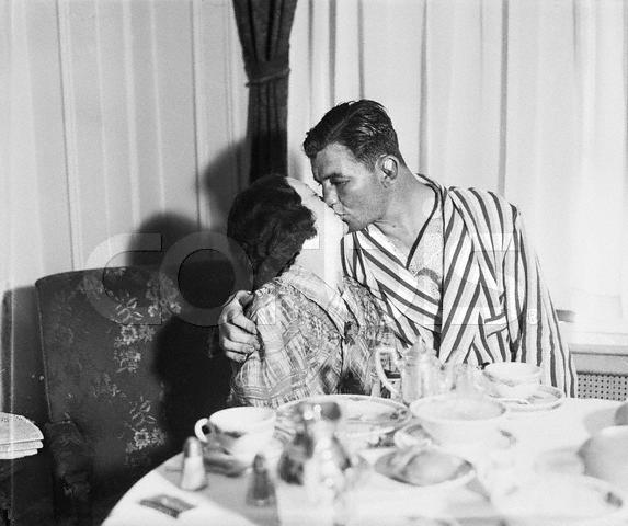 May and James Braddock Kissing