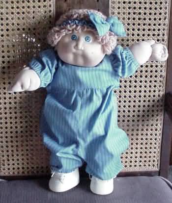 Samantha modeling a blue play suit