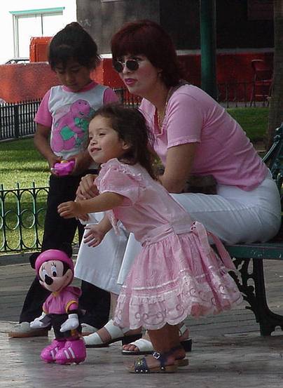 Little girl and Mickey Mouse