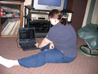 Liz plays Stepmania on the laptop before the meeting.