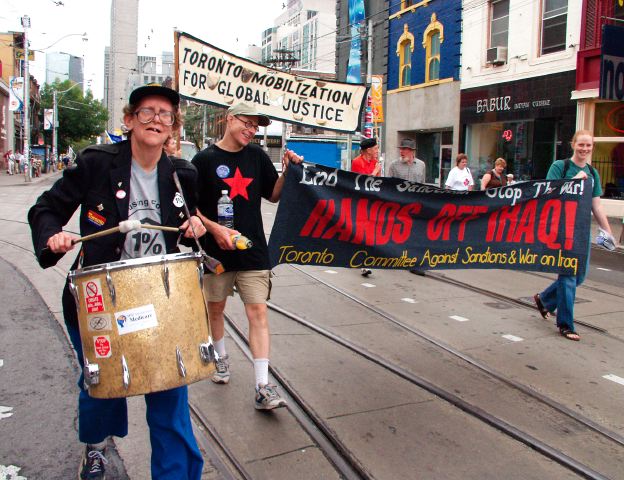 drumming in the Labour Day Parade/2002, picture taken by professional photographer, David Smiley