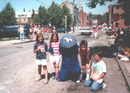 "My" kids with Cookie Monster of Sesame Street on Bunker Hill Day in Boston